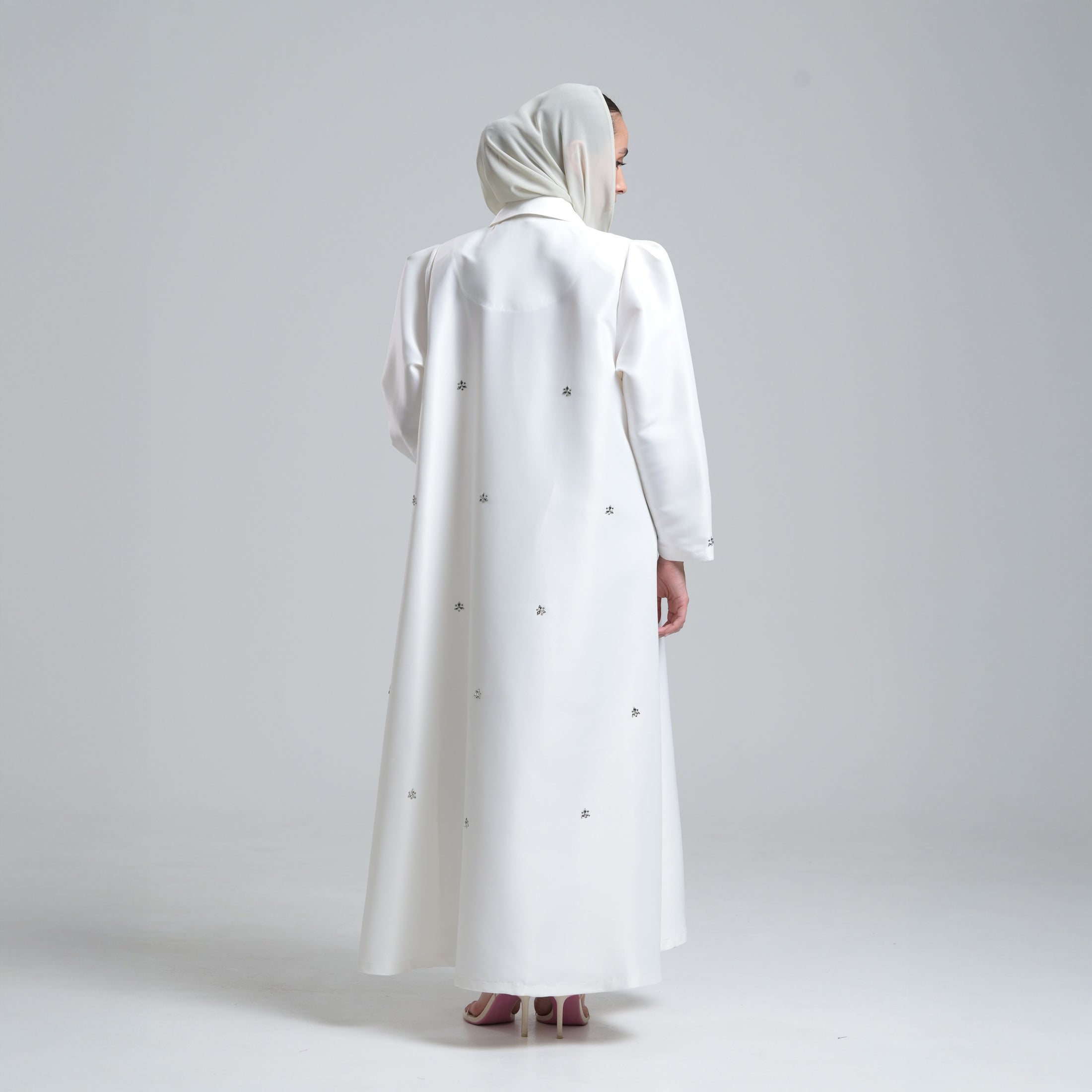 Woman wearing a long white dress